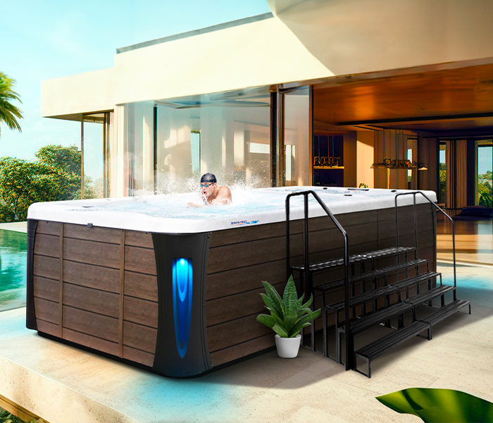 Calspas hot tub being used in a family setting - Newton